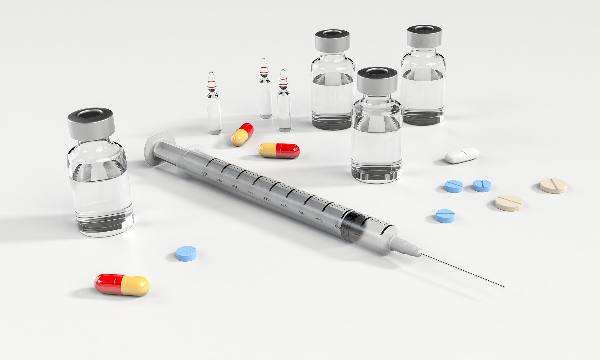 A picture of various pharmaceuticals and syringe that could be used to compound bulk substances