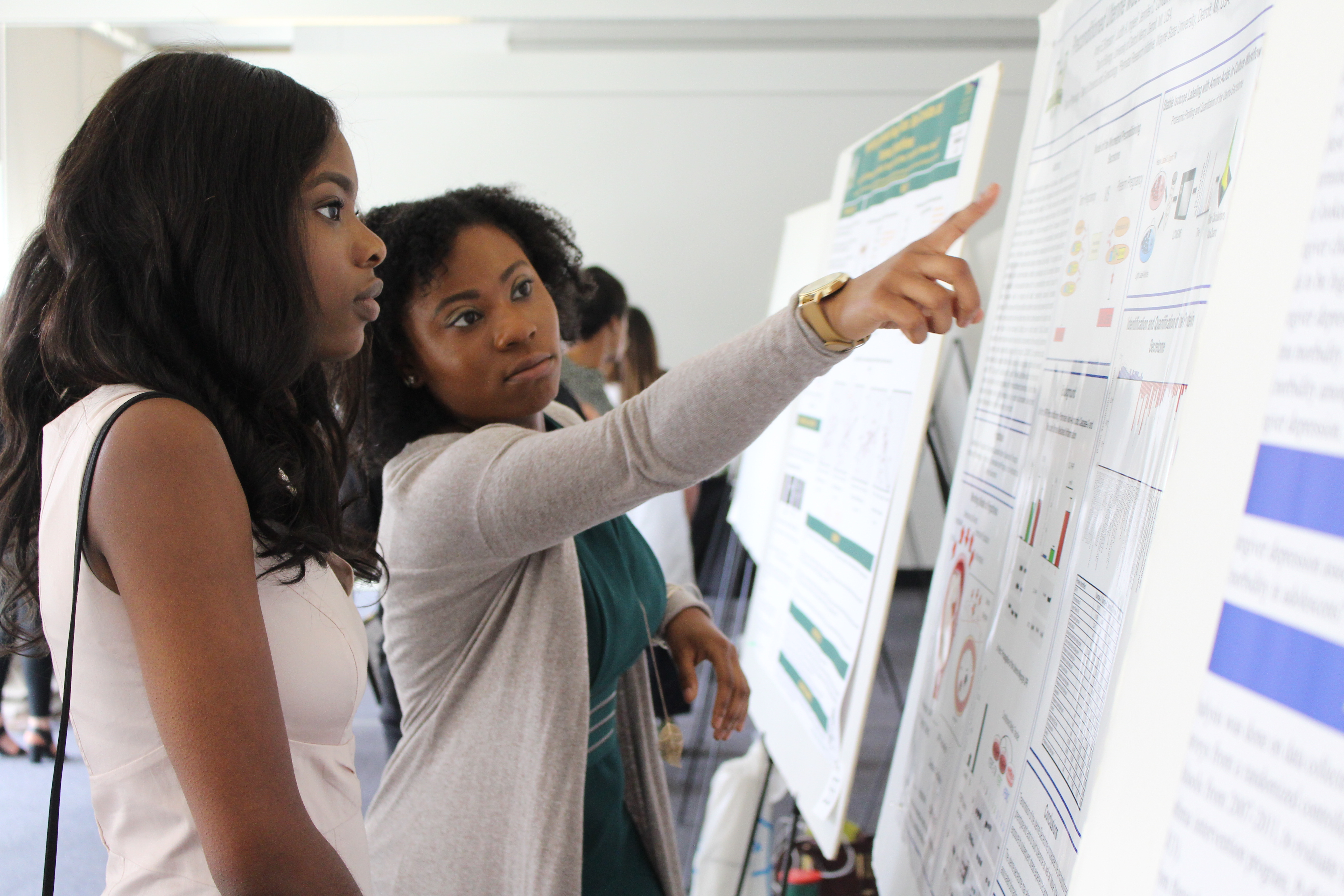students at a poster presentation